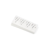 Stack of Lav Concealer Tiny Tape on a white background